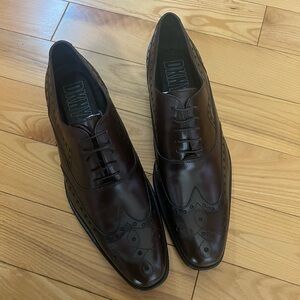 DKNY Brand New brown men’s loafers size 10